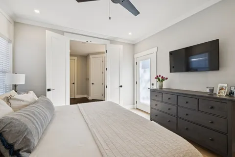 a bathroom with a sink mirror toilet and bathtub
