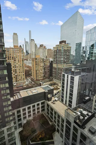 a view of a city with tall buildings