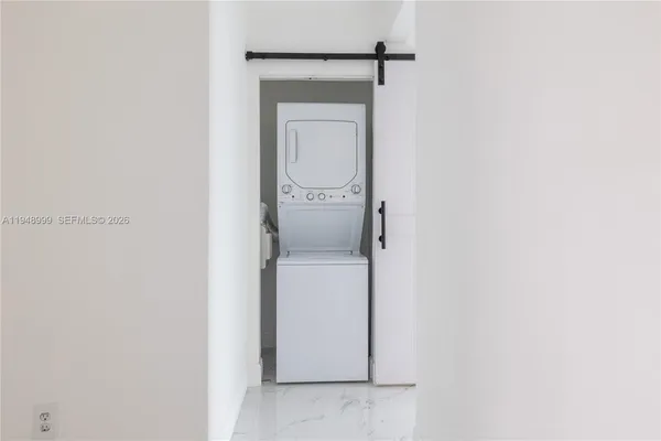 a utility room with a washer and dryer