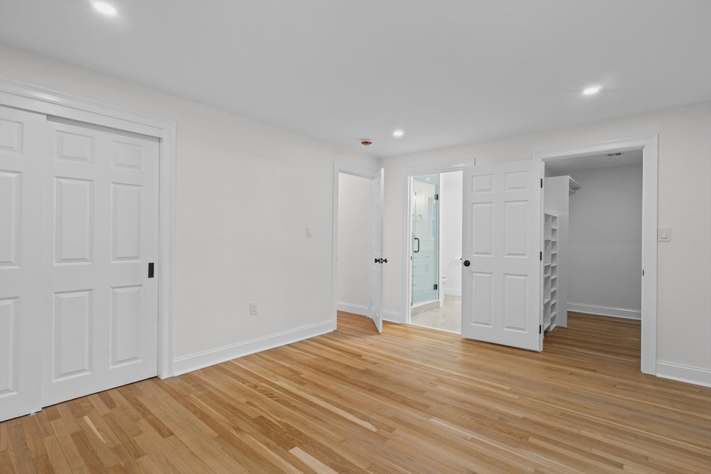 217 Central Street Framingham, MA 01701 - Photo 16 of 42 a view of empty room with wooden floor