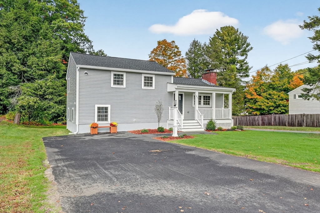 217 Central Street Framingham, MA 01701 - Photo 42 of 42 a view of a house with a yard and a garden