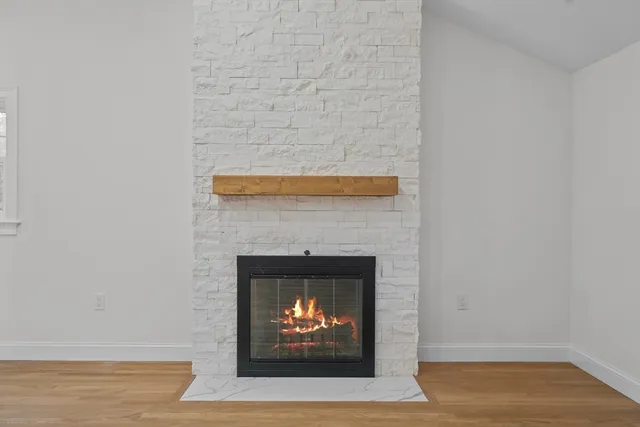 a room with a fireplace