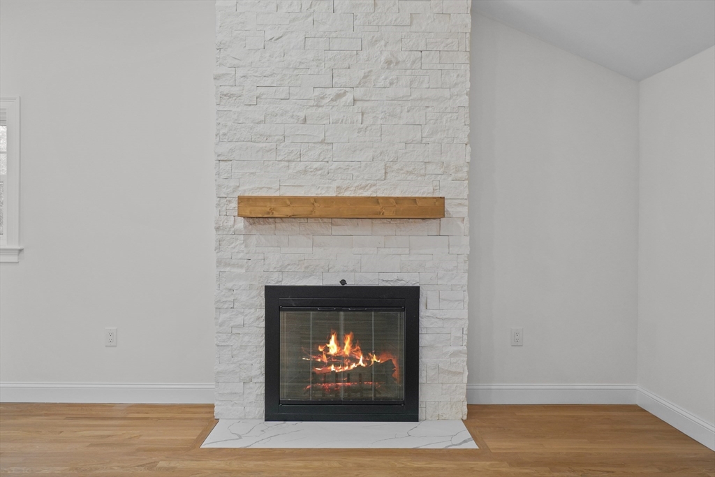 217 Central Street Framingham, MA 01701 - Photo 6 of 42 a room with a fireplace