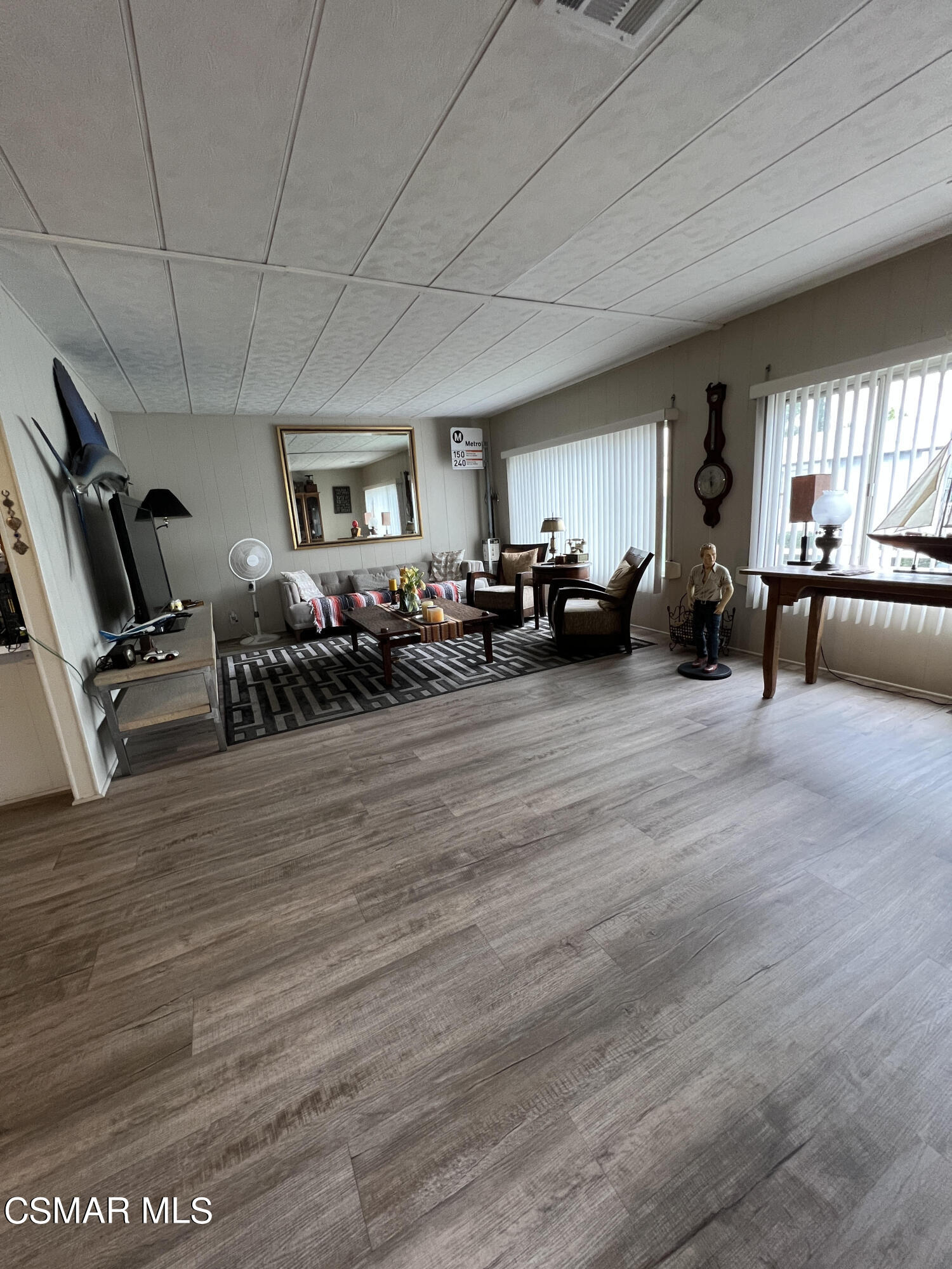 1550 Rory Lane, Unit 83 Simi Valley, CA 93063 - Photo 13 of 50 a view of a livingroom with furniture play ground and windows