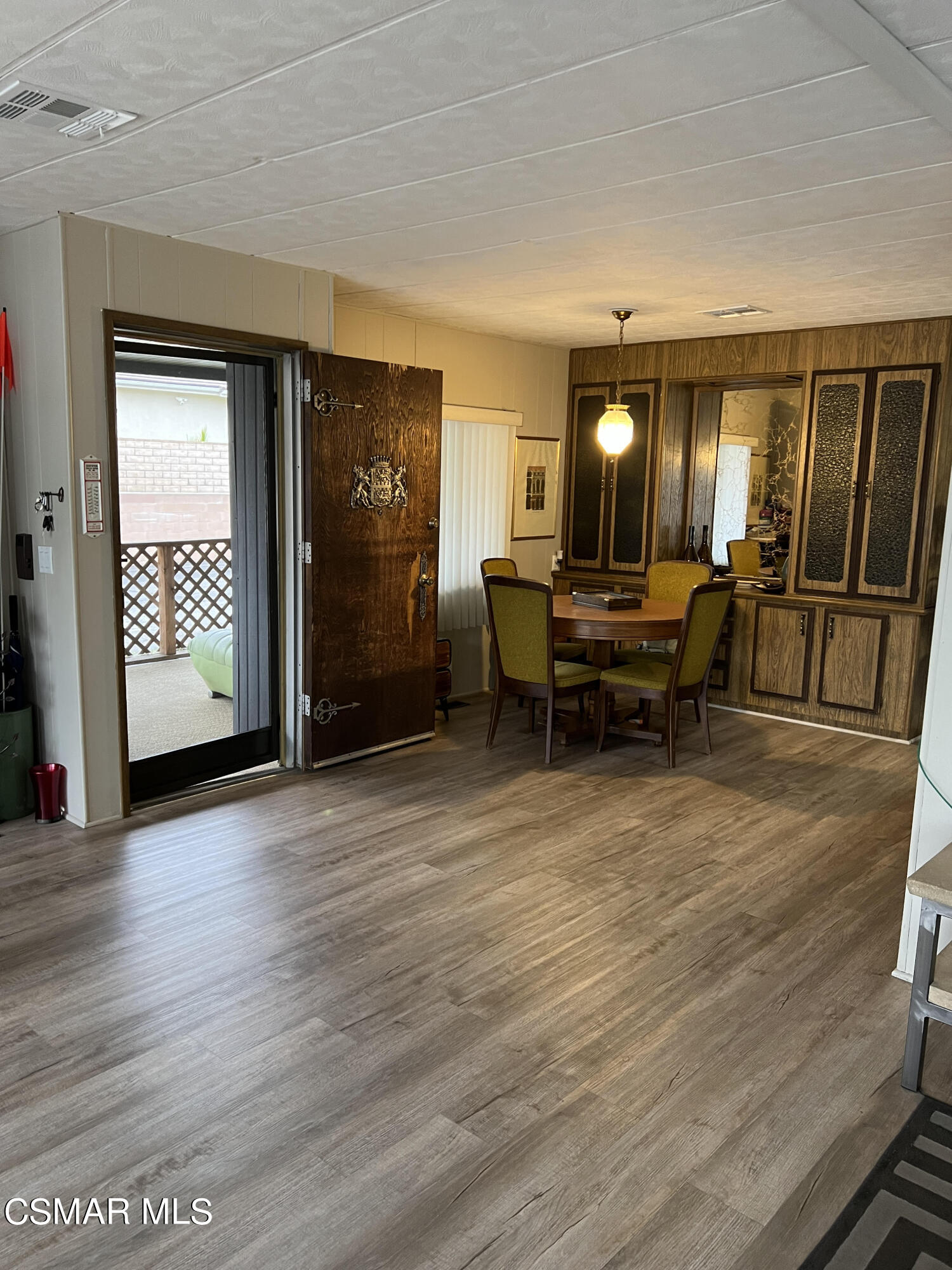 1550 Rory Lane, Unit 83 Simi Valley, CA 93063 - Photo 15 of 50 a living room with furniture and wooden floor