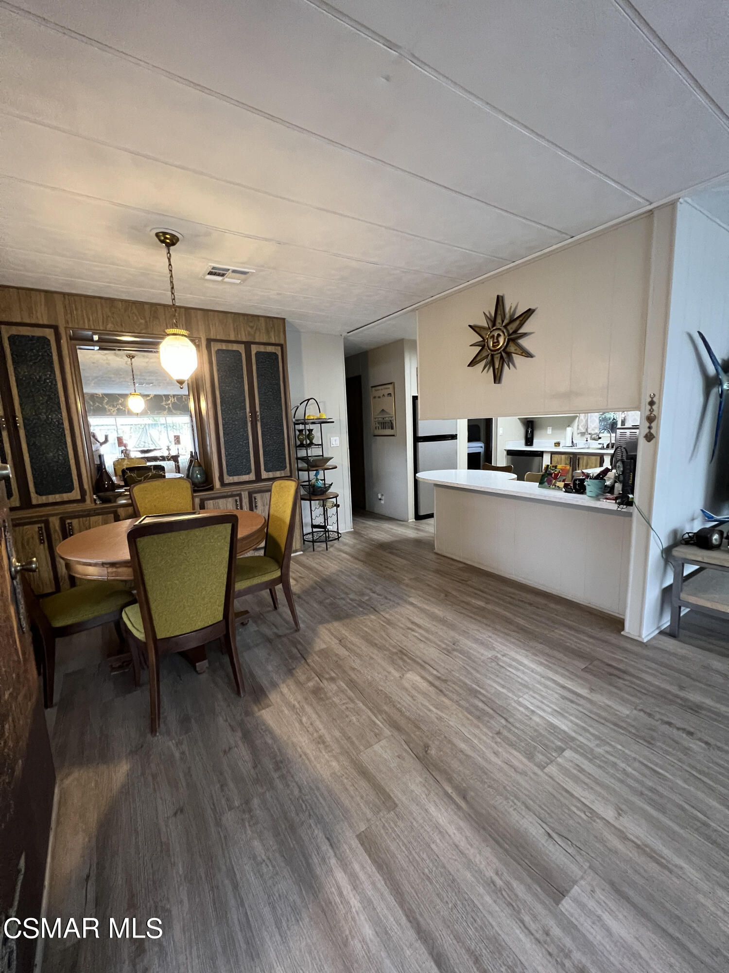 1550 Rory Lane, Unit 83 Simi Valley, CA 93063 - Photo 16 of 50 a living room with furniture and a wooden floor