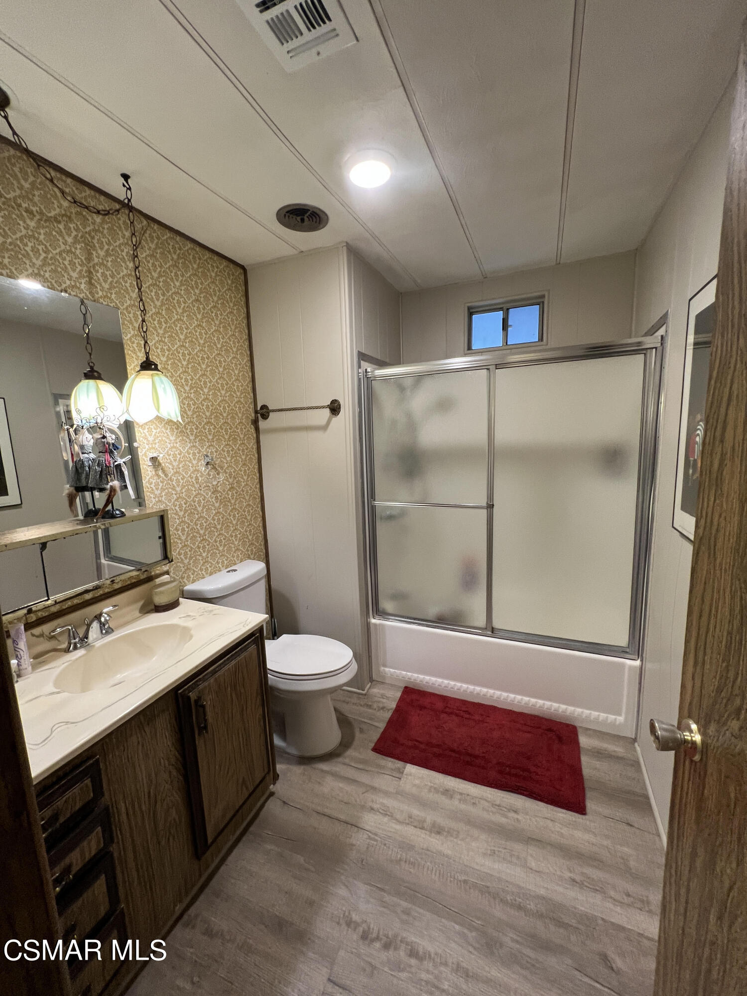 1550 Rory Lane, Unit 83 Simi Valley, CA 93063 - Photo 23 of 50 a bathroom with a sink toilet and shower