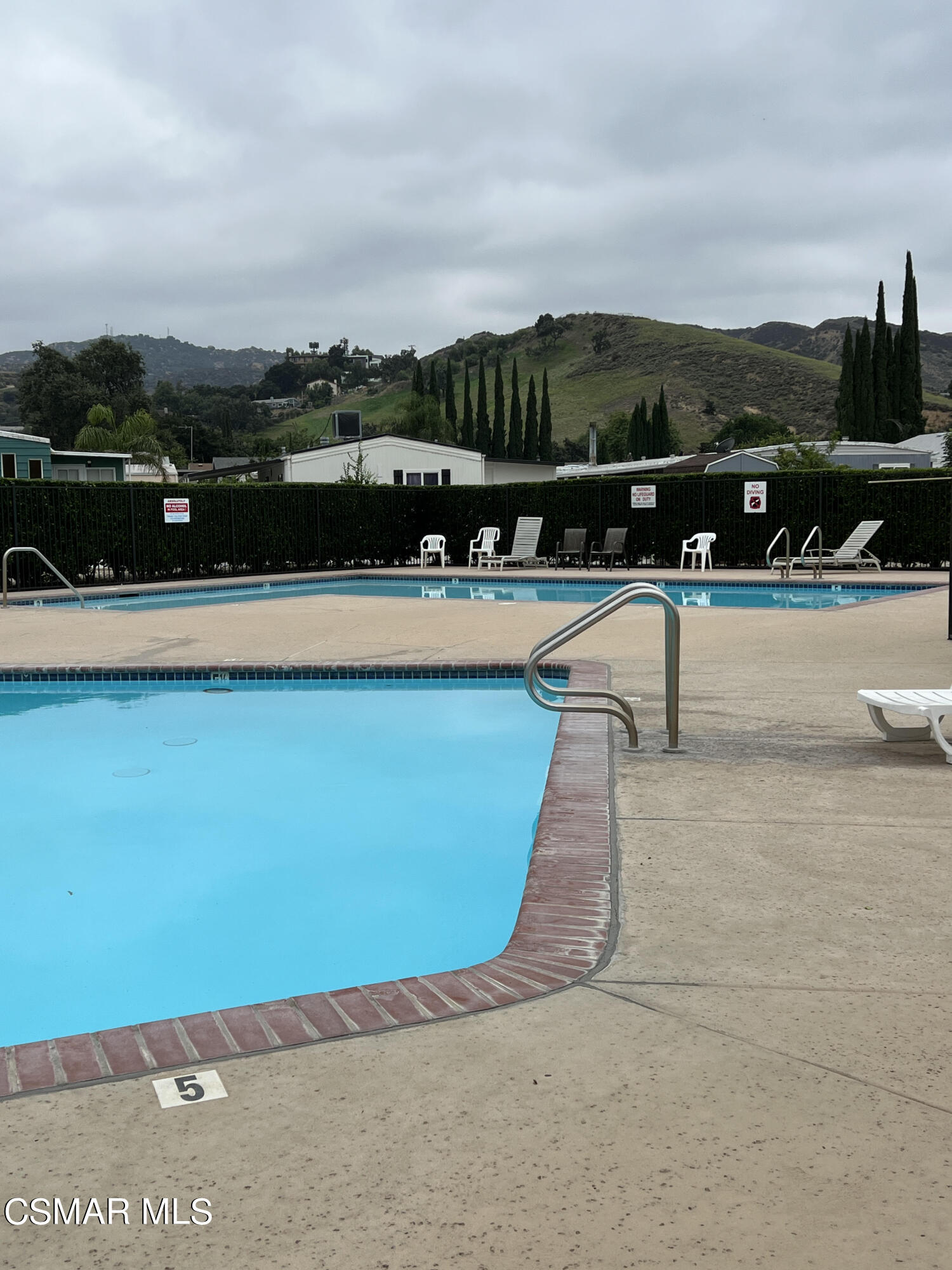 1550 Rory Lane, Unit 83 Simi Valley, CA 93063 - Photo 27 of 50 a view of swimming pool with a terrace