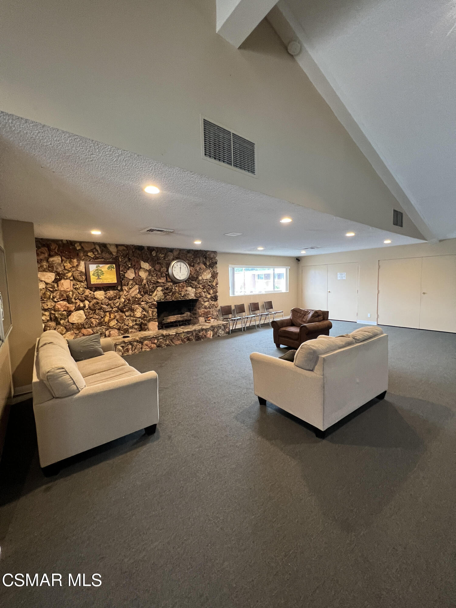 1550 Rory Lane, Unit 83 Simi Valley, CA 93063 - Photo 37 of 50 a living room with furniture and a potted plant