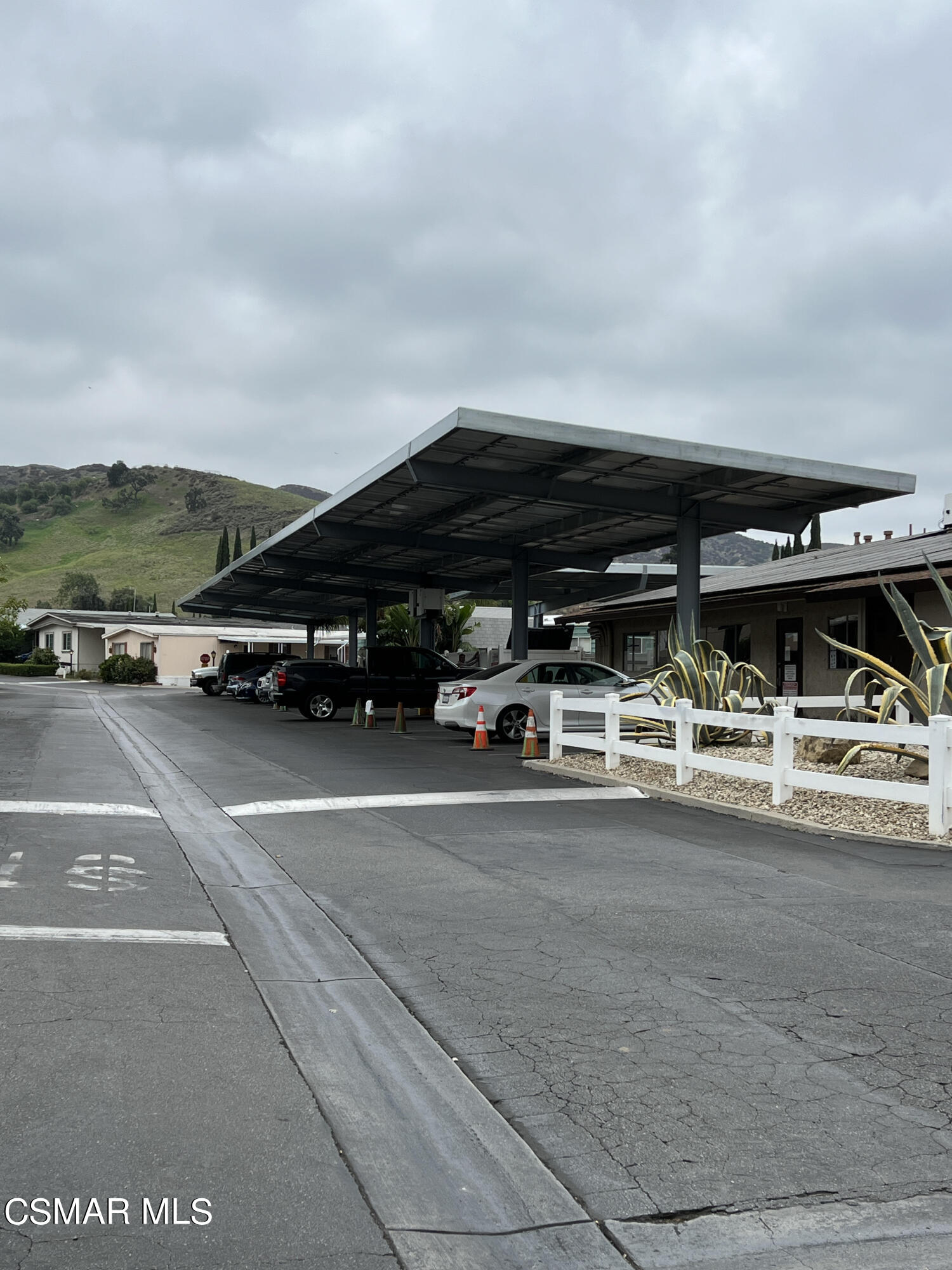1550 Rory Lane, Unit 83 Simi Valley, CA 93063 - Photo 43 of 50 a view of parking with cars parked