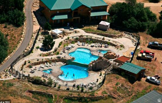 793 South Zion Road Orderville, UT 84758 - Photo 12 of 12 Multi-tiered swimming pool complex featuring a primary pool, a smaller secondary pool, and an integrated spa