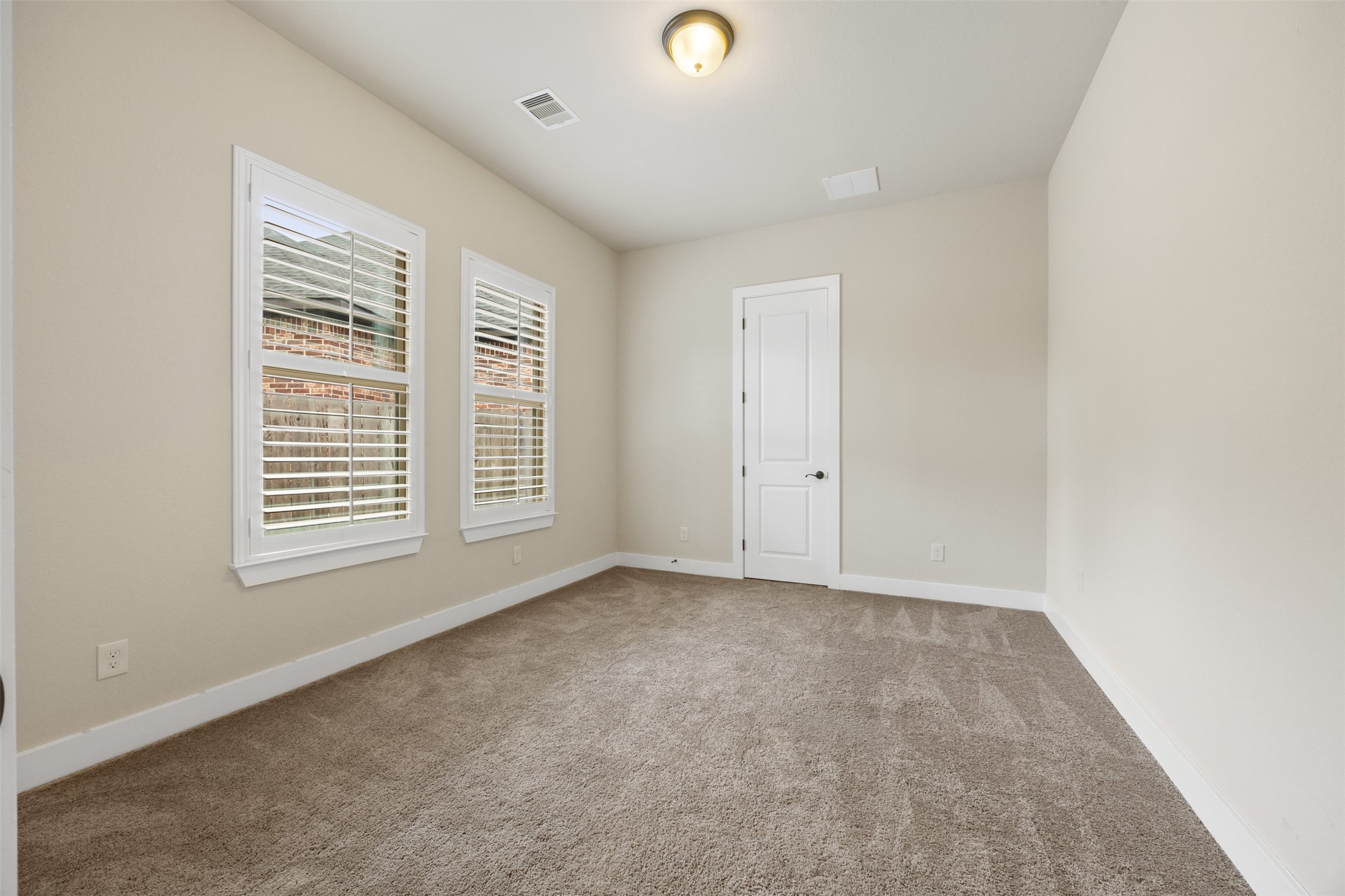 6515 Fraser Point Spring, TX 77379 - Photo 16 of 39 a view of an empty room with a window