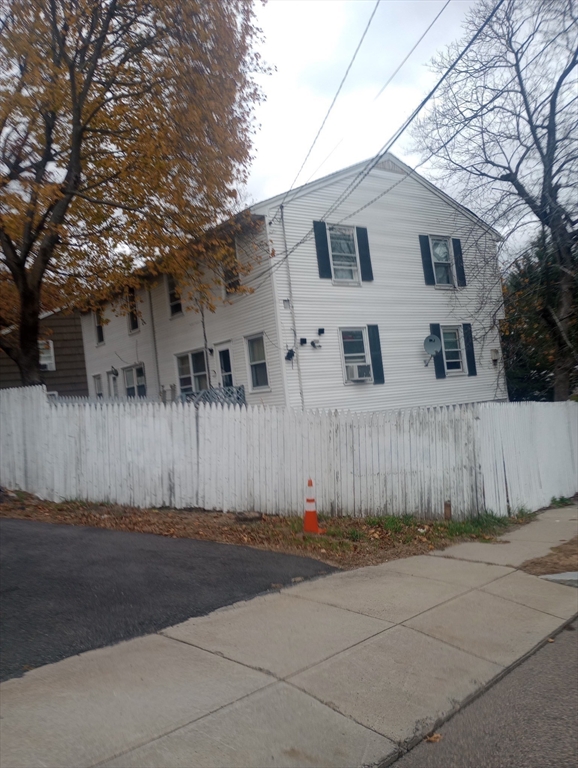 42 Raldne Road, Unit 1 Boston, MA 02136 - Photo 36 of 37 a front view of a house with garage