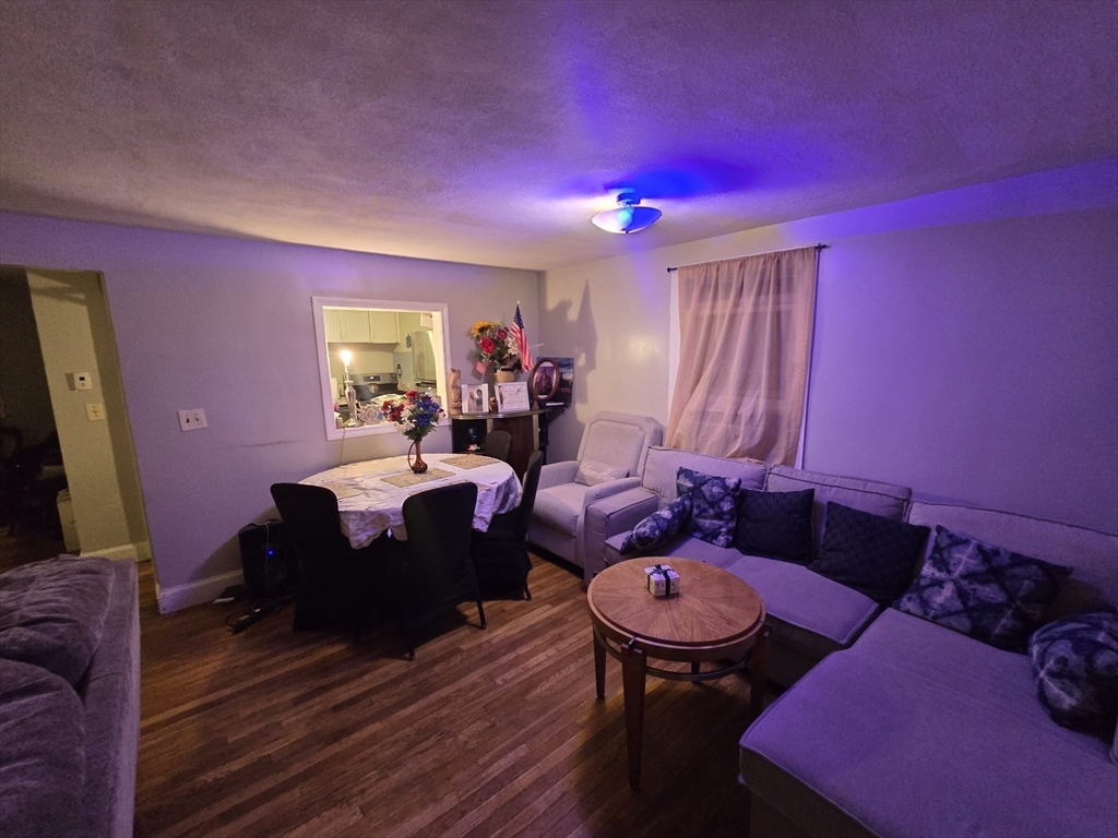 42 Raldne Road, Unit 1 Boston, MA 02136 - Photo 6 of 37 a living room with furniture and wooden floor