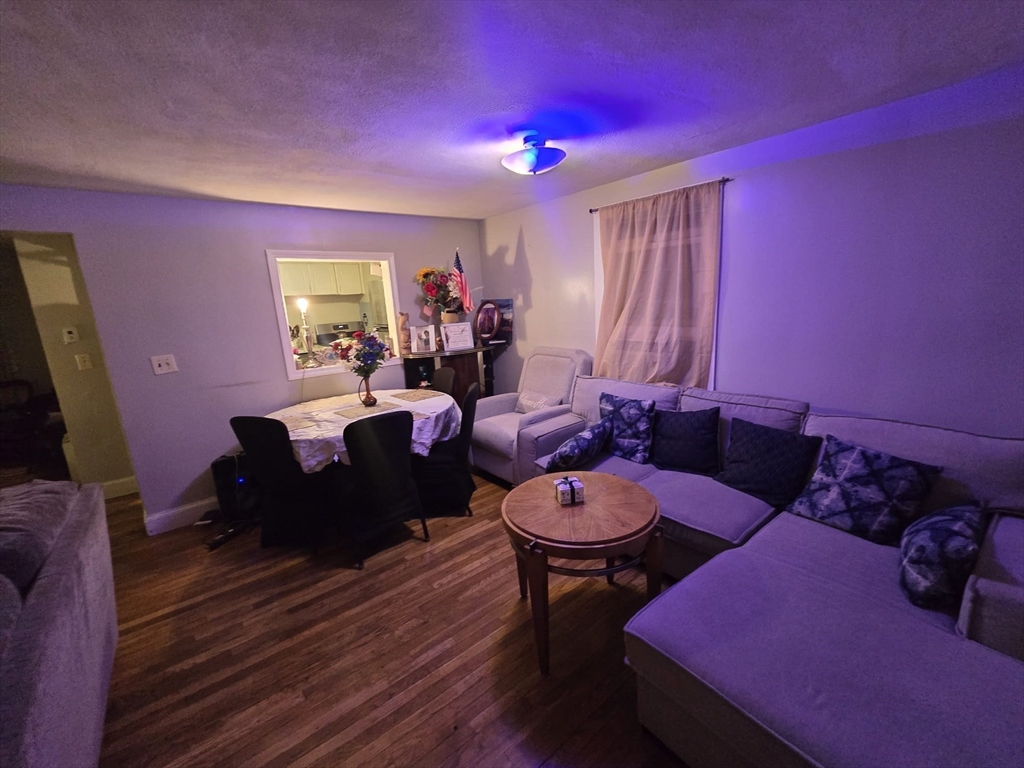 42 Raldne Road, Unit 1 Boston, MA 02136 - Photo 9 of 37 a living room with furniture and a flat screen tv