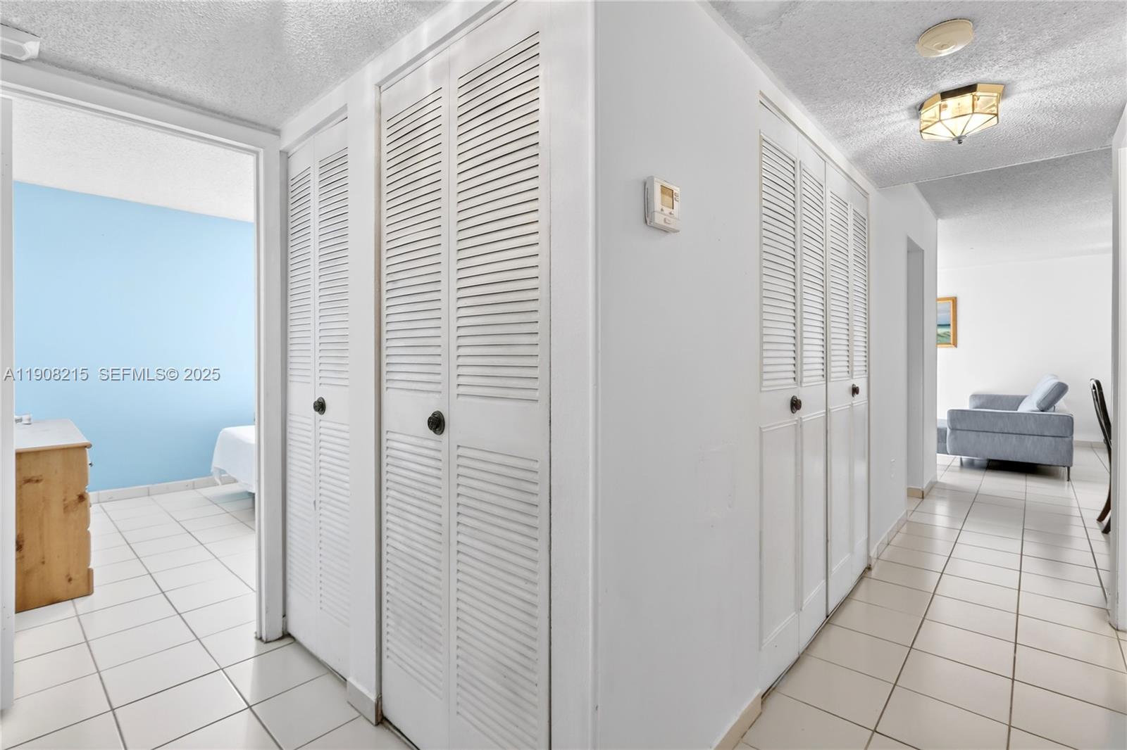 9401 Southwest 4th Street, Unit 3016 Miami, FL 33174 - Photo 13 of 17 a view of a bathroom from the hallway