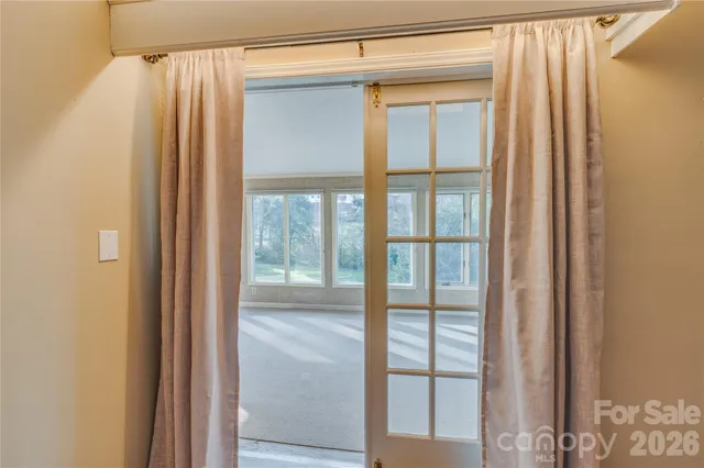 a view of an empty room and window