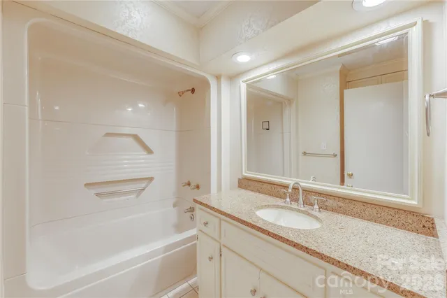 a view of a porch with wooden floor and outdoor space