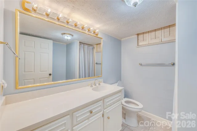 a picture of a bathroom with a sink