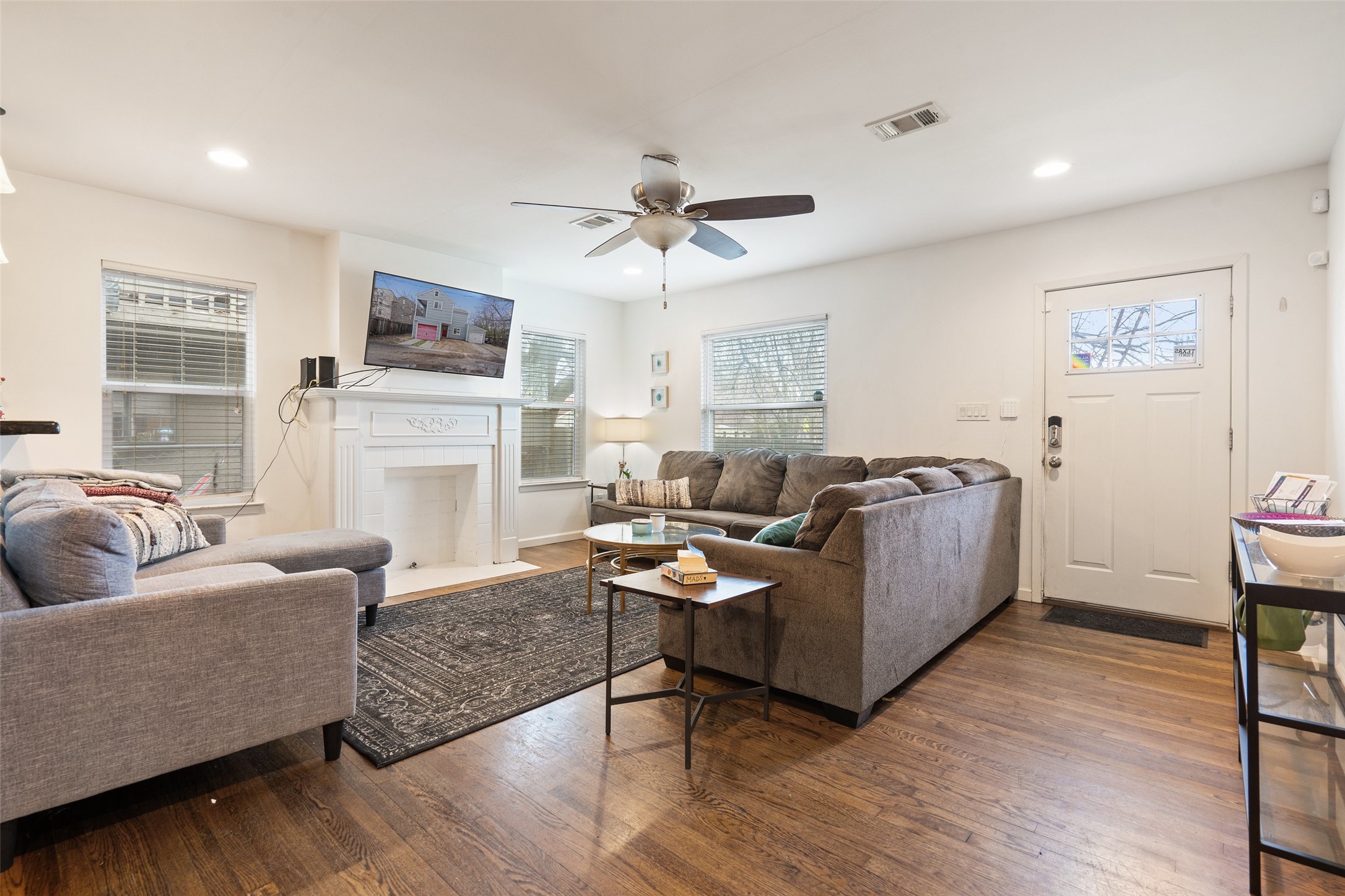 3504 Speedway, Unit A Austin, TX 78705 - Photo 2 of 22 a living room with furniture and a fireplace