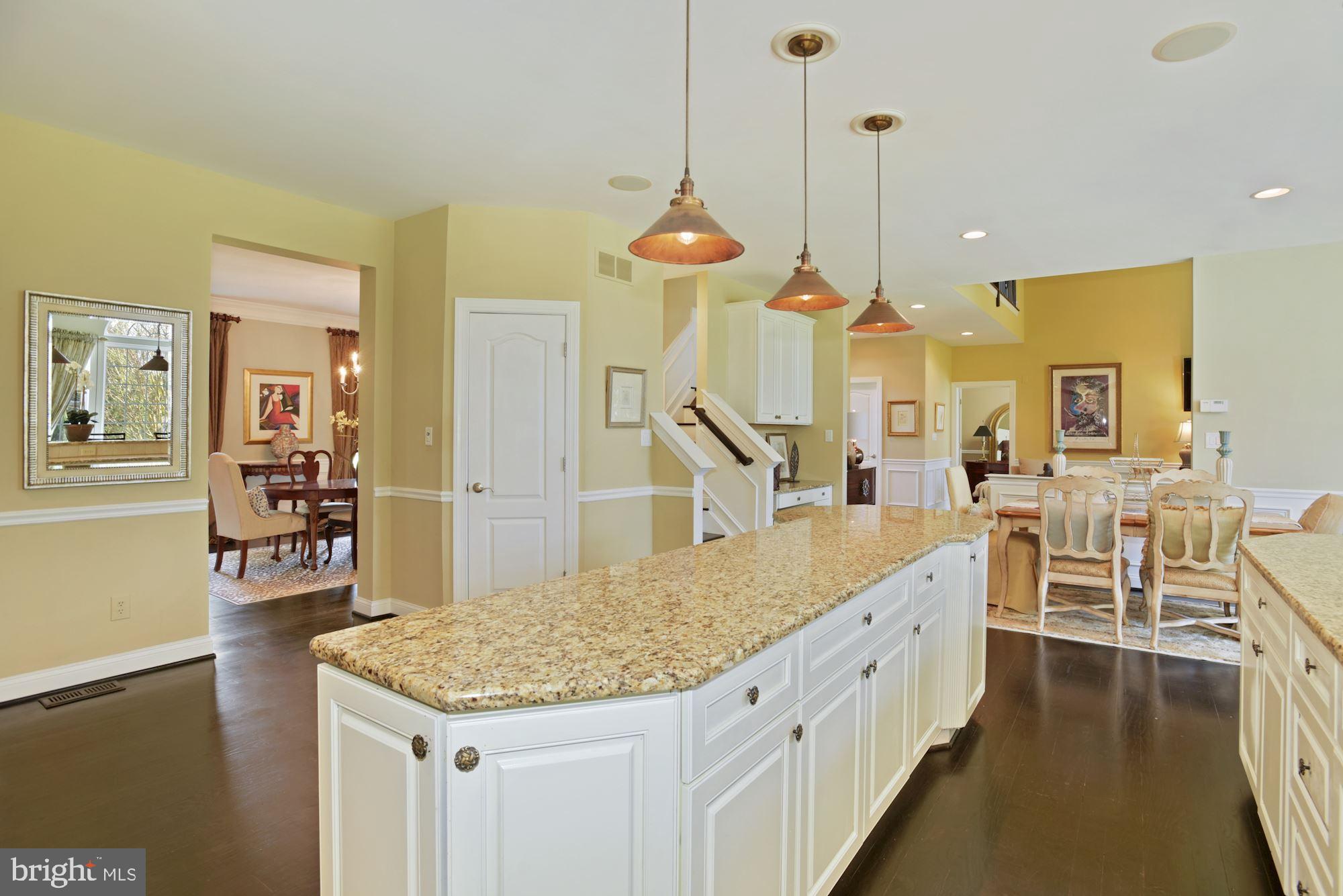 74 Balsam Road Lumberton, NJ 08048 - Photo 17 of 56 a view of a kitchen with kitchen island stainless steel appliances kitchen island granite countertop a stove a sink a dining table and chairs