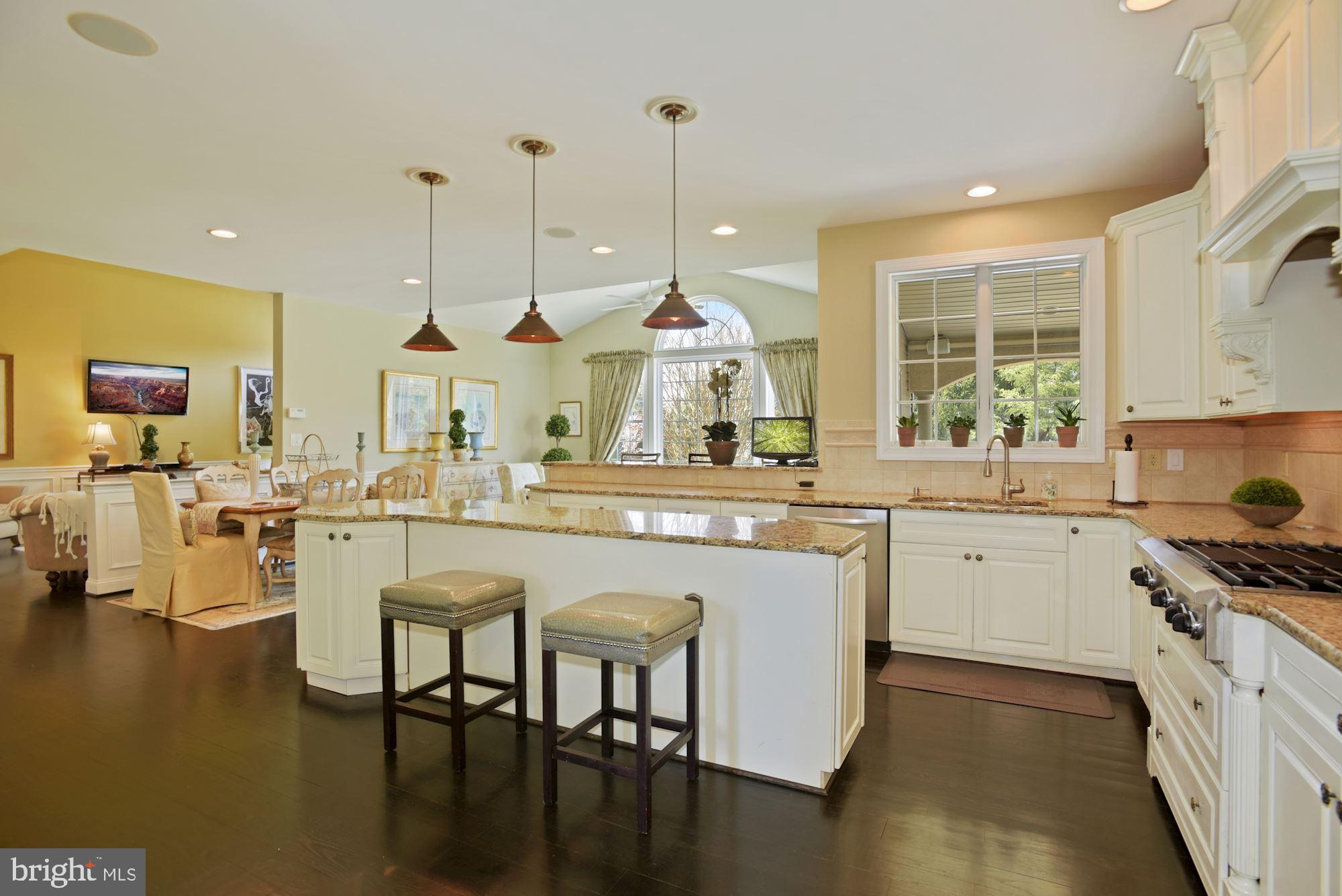 74 Balsam Road Lumberton, NJ 08048 - Photo 18 of 56 a kitchen with stove a sink and chairs
