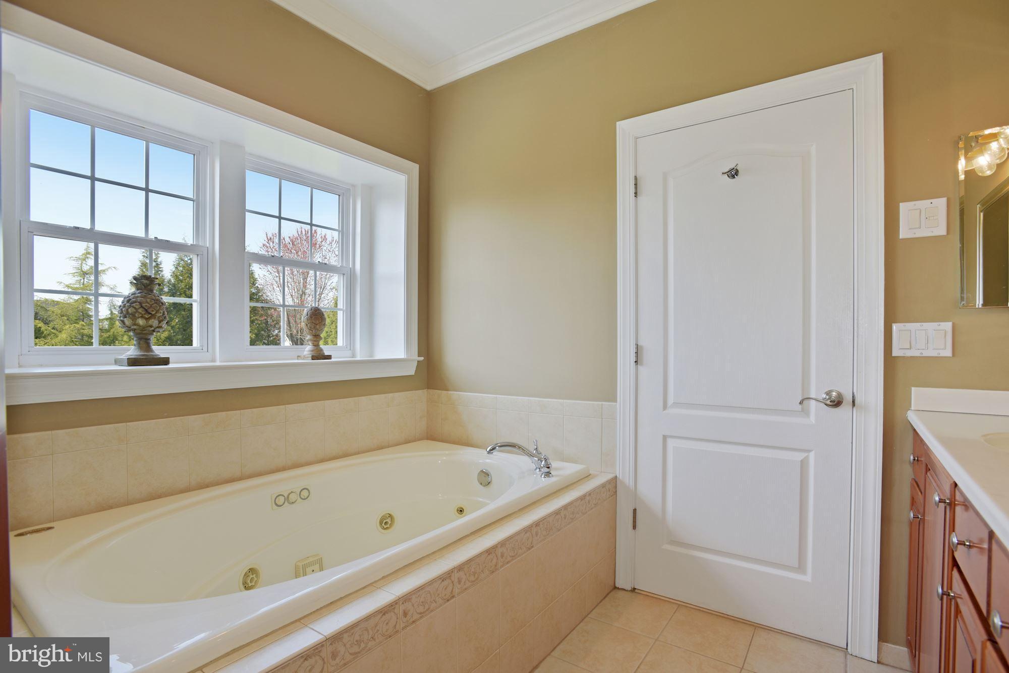 74 Balsam Road Lumberton, NJ 08048 - Photo 32 of 56 a bathroom with a bathtub and a shower