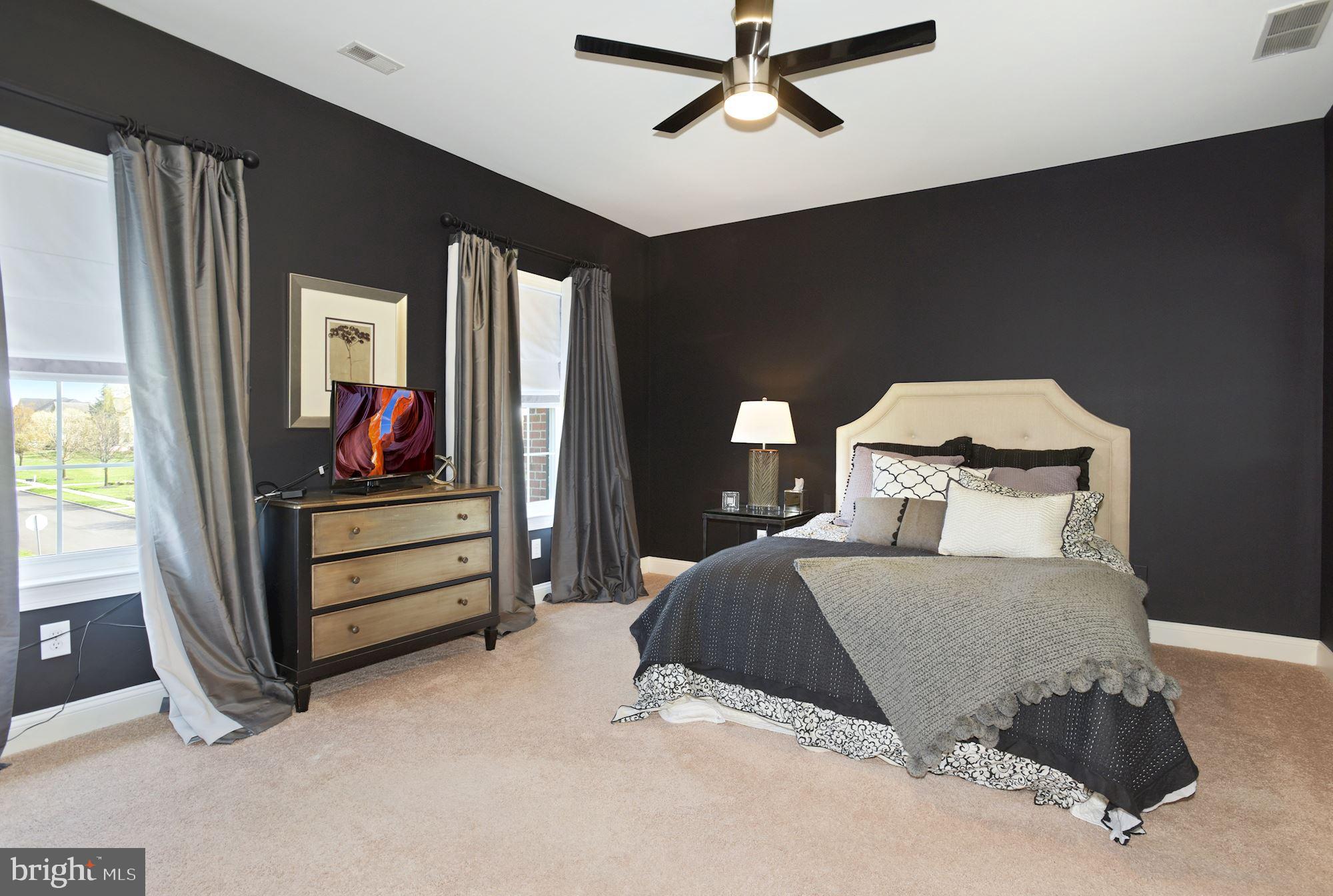 74 Balsam Road Lumberton, NJ 08048 - Photo 33 of 56 a bedroom with a bed and wooden floor