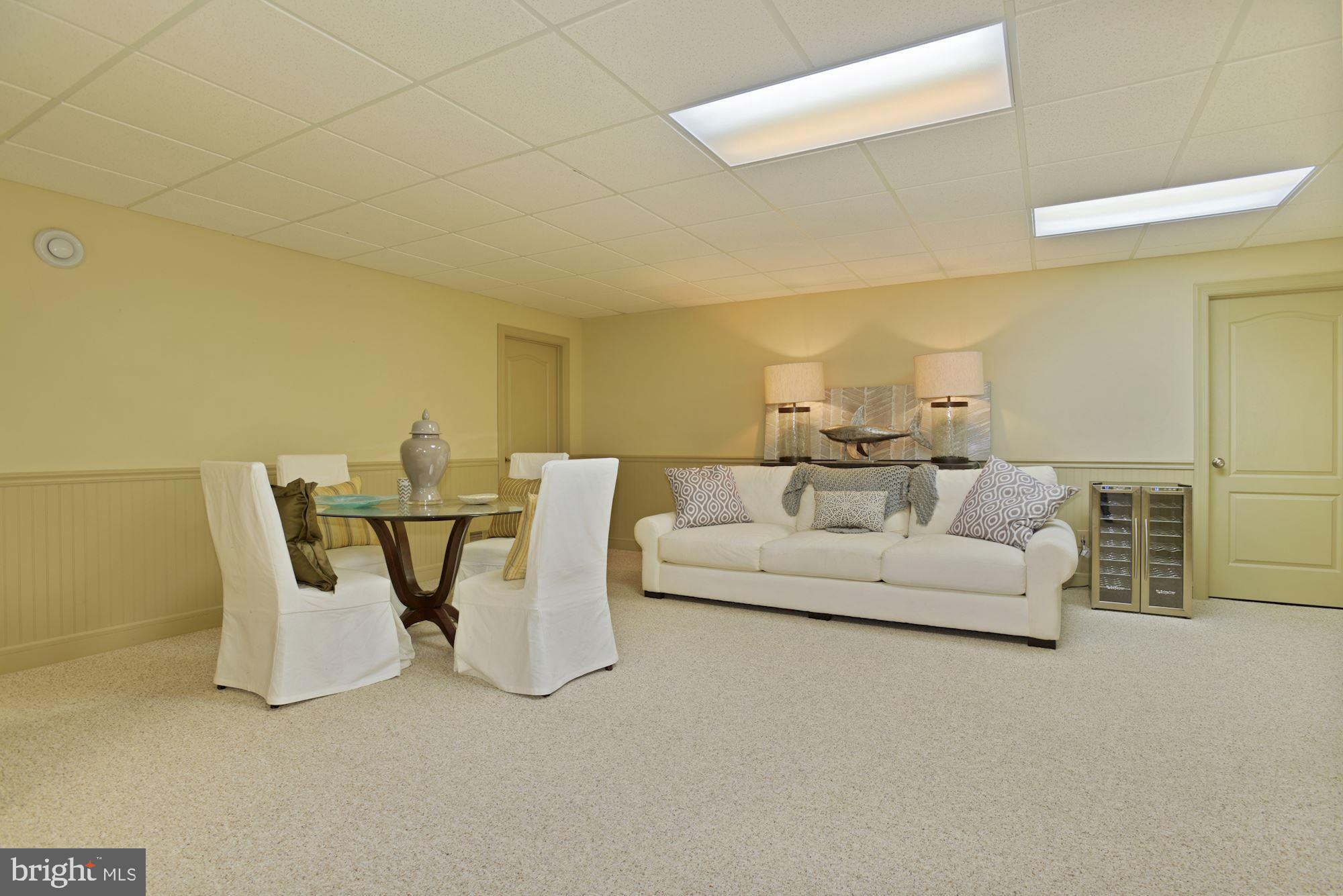74 Balsam Road Lumberton, NJ 08048 - Photo 39 of 56 a living room with furniture and a table