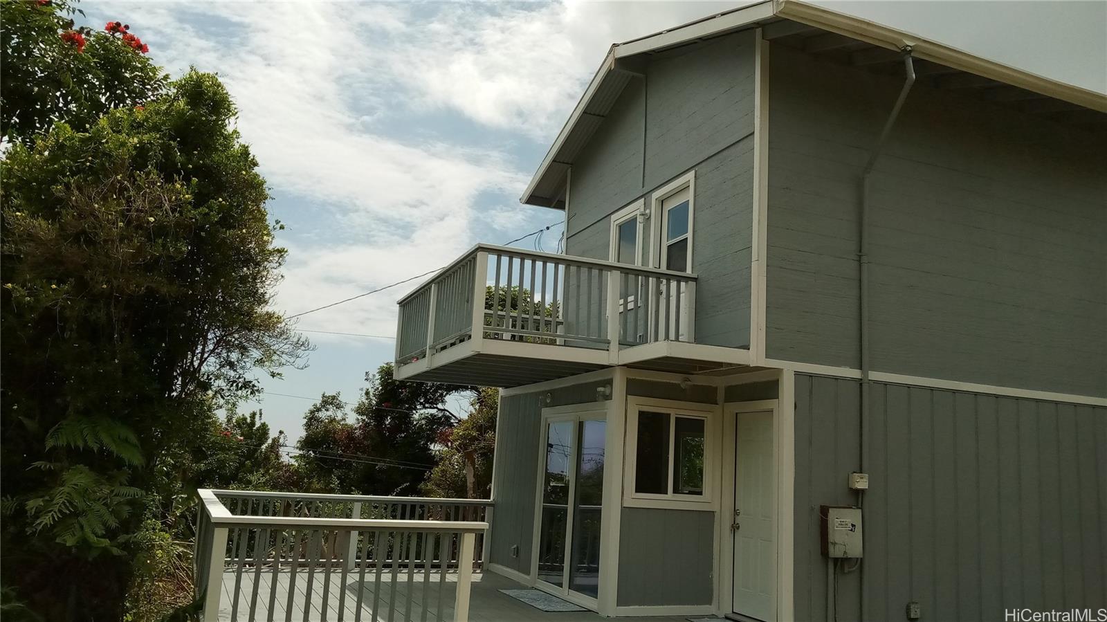 81-1085A Captain Cook Road Captain Cook, HI 96704 - Photo 1 of 1 a view of a house with a deck