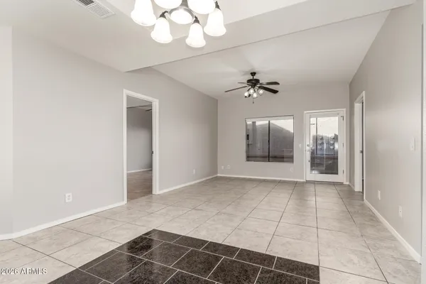 a view of an empty room with a bathroom