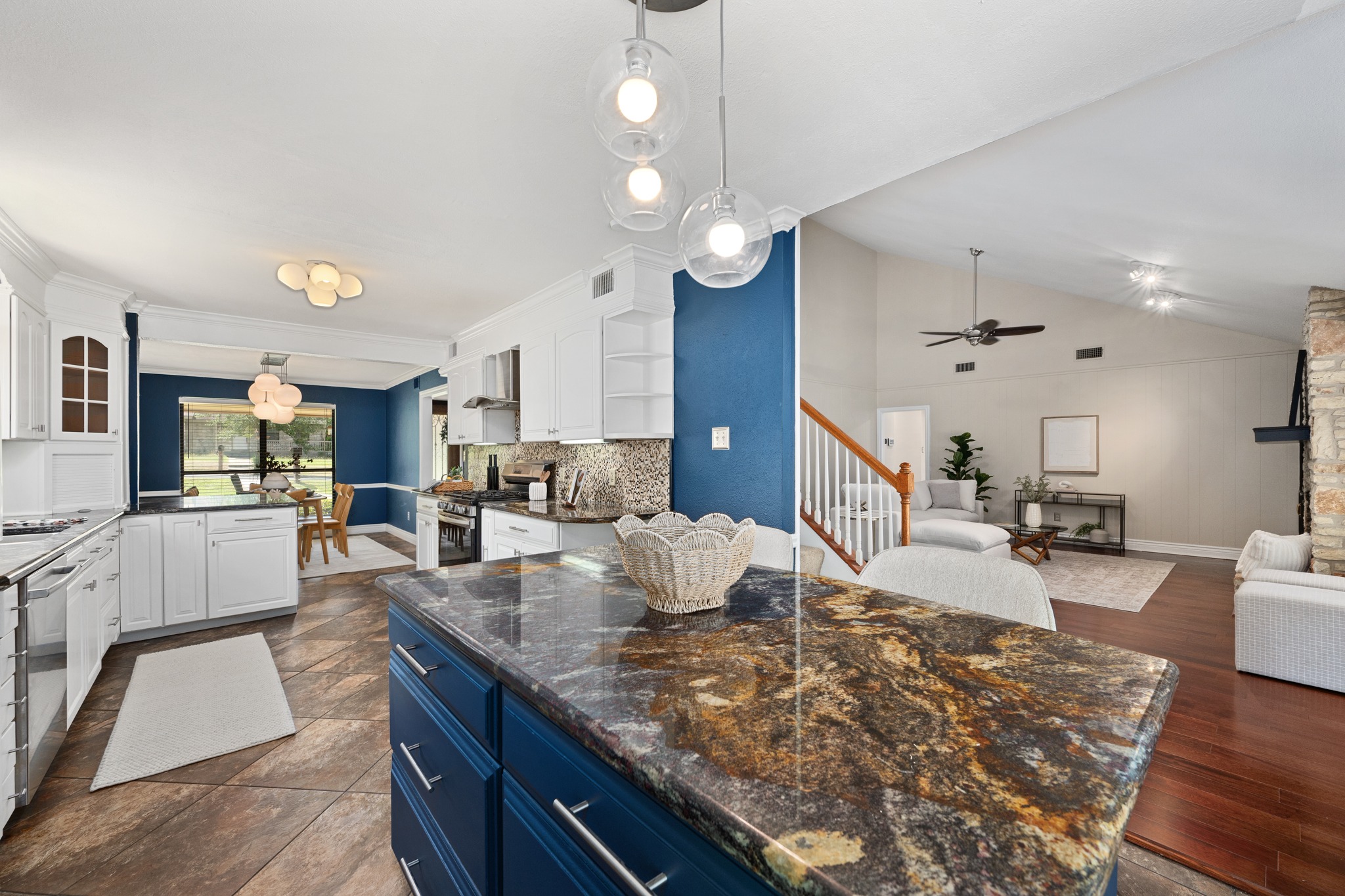 3908 Valley View Round Rock, TX 78681 - Photo 12 of 39 The kitchen keeps you connected to the main living and dining areas, with a center island that adds prep space, storage, and an easy spot to gather.