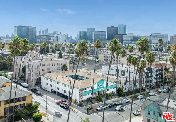a view of a city with tall buildings