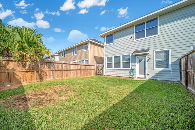 a house view with a garden space
