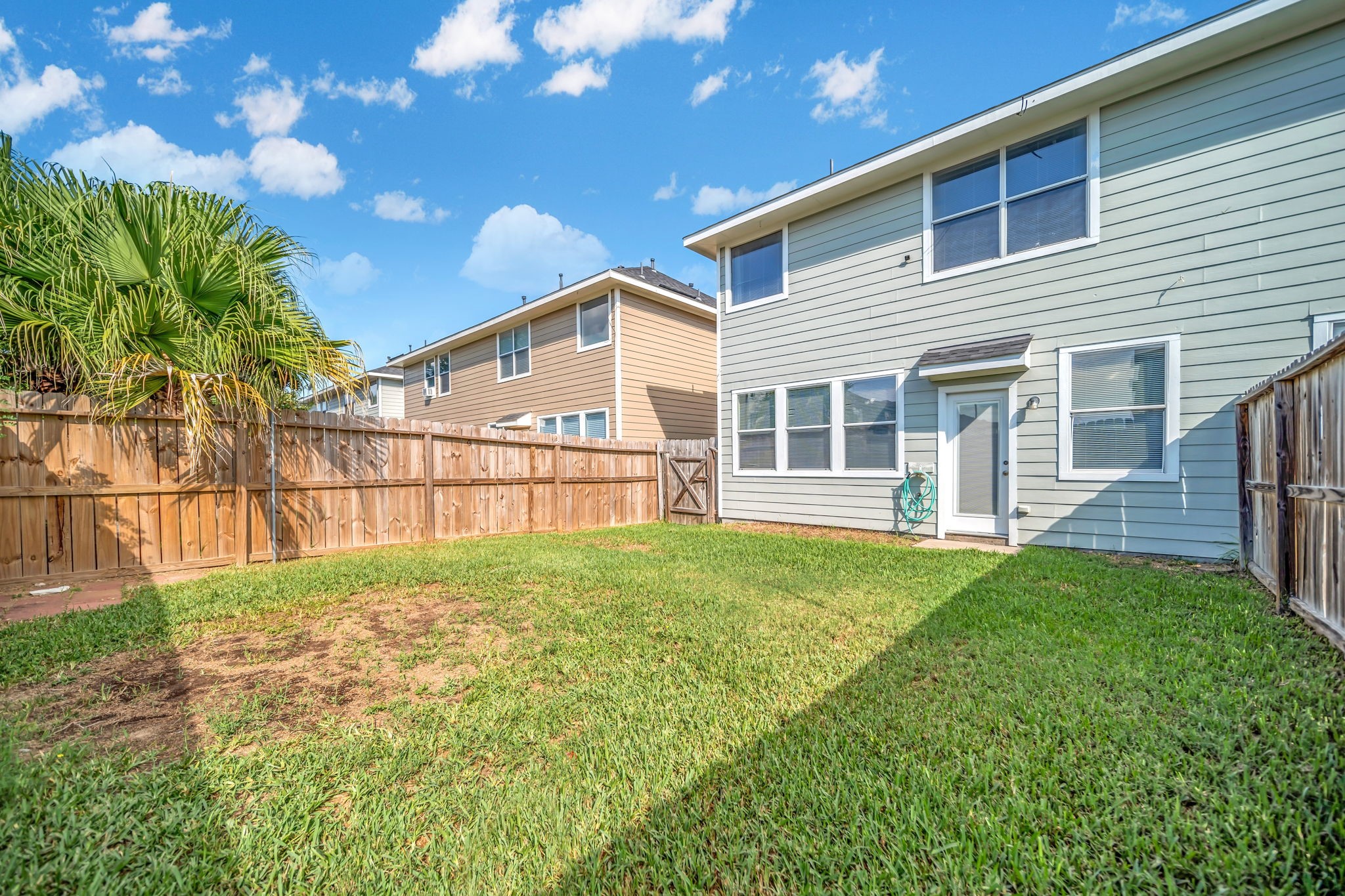8918 Elm Drake Lane Humble, TX 77338 - Photo 19 of 20 a house view with a garden space