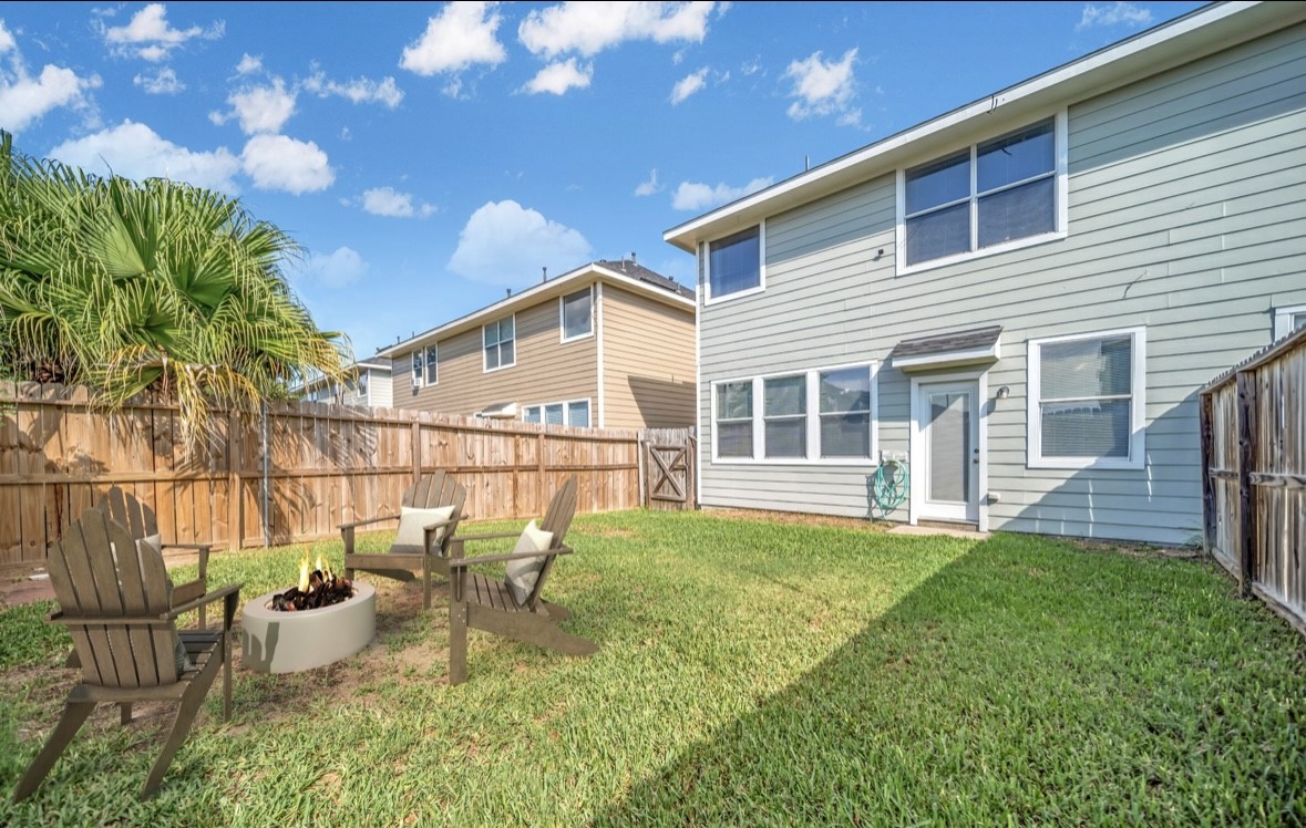 8918 Elm Drake Lane Humble, TX 77338 - Photo 20 of 20 a view of a house with backyard and sitting area