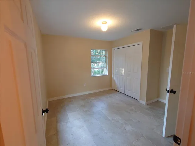 a view of a livingroom with a furniture
