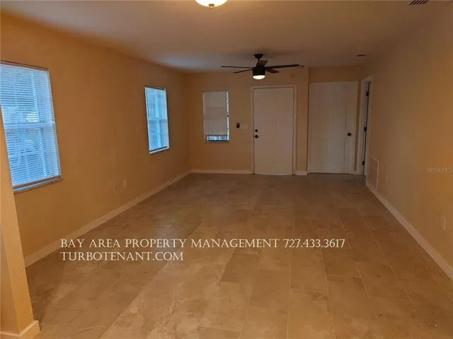 a bathroom with a sink mirror vanity and toilet