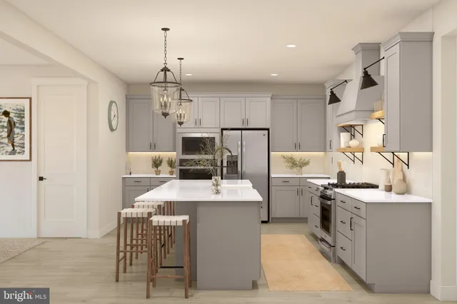 a kitchen with a sink stove and refrigerator