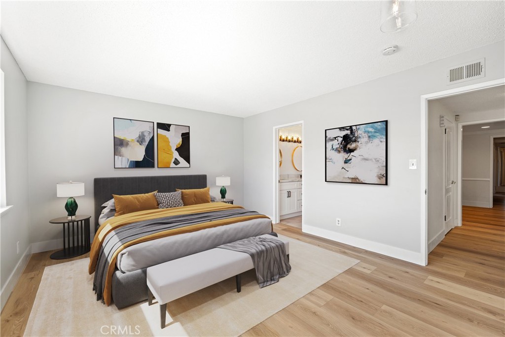 1176 Steele Drive Brea, CA 92821 - Photo 14 of 39 a bedroom with a bed and painting on the wall