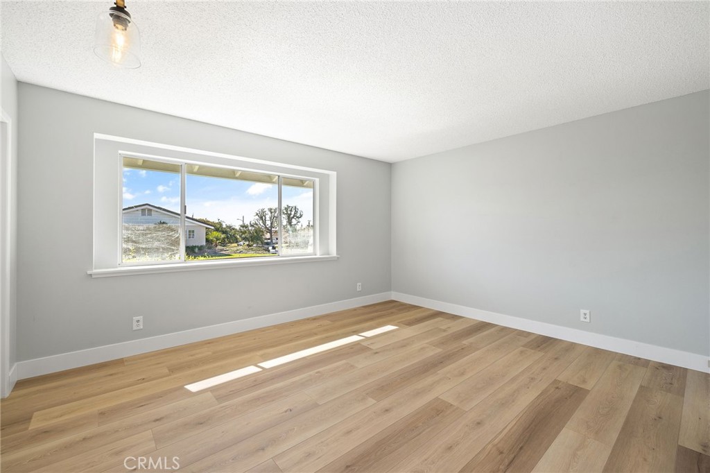 1176 Steele Drive Brea, CA 92821 - Photo 16 of 39 wooden floor in an empty room with a window