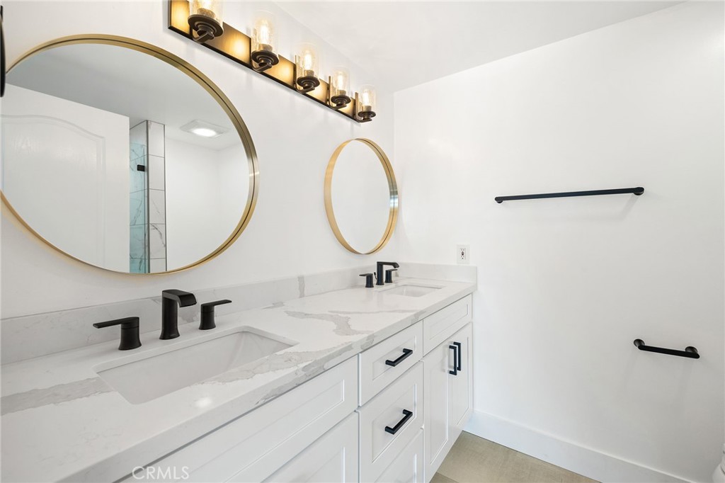 1176 Steele Drive Brea, CA 92821 - Photo 19 of 39 a bathroom with a sink and a mirror