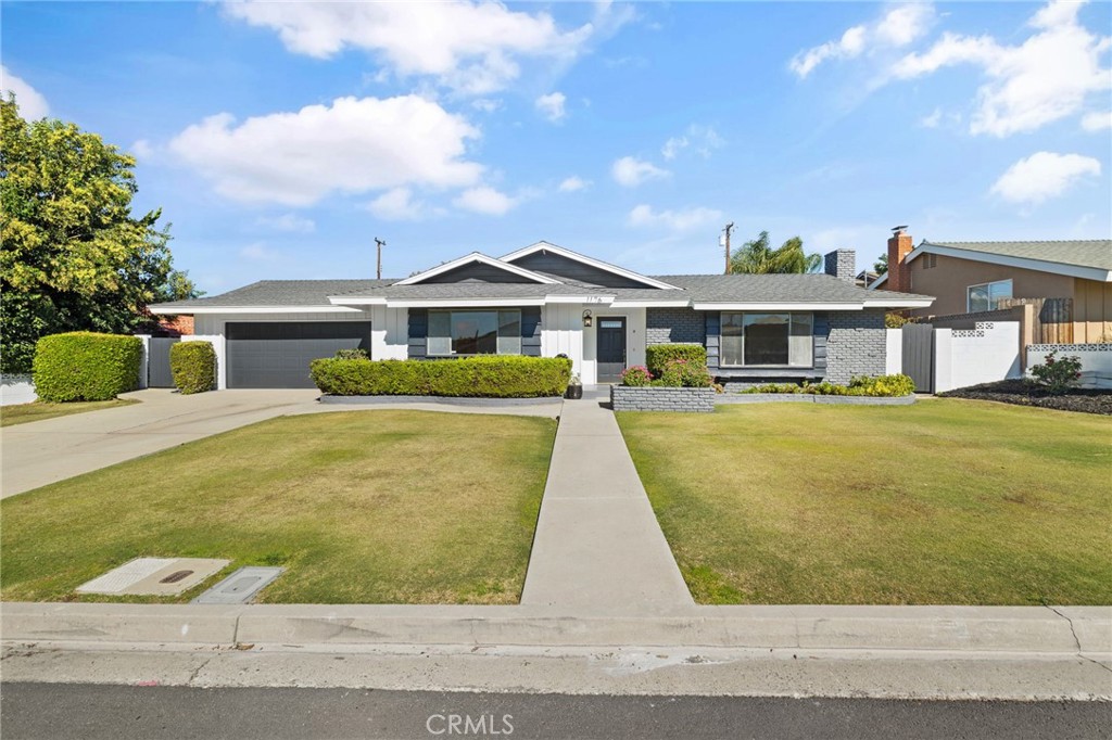 1176 Steele Drive Brea, CA 92821 - Photo 2 of 39 a front view of a house with a yard