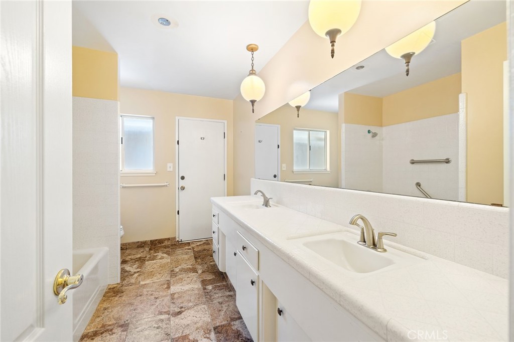 1176 Steele Drive Brea, CA 92821 - Photo 23 of 39 a bathroom with a sink and a mirror
