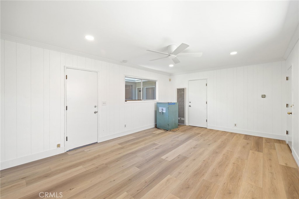 1176 Steele Drive Brea, CA 92821 - Photo 30 of 39 a view of an empty room with wooden floor and a window