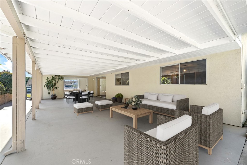 1176 Steele Drive Brea, CA 92821 - Photo 36 of 39 a living room with furniture and a flat screen tv