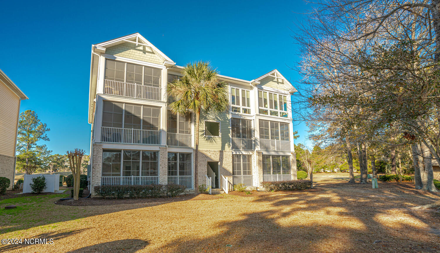 170 Clubhouse Road, Unit 2 Sunset Beach, NC 28468 - Photo 4 of 52 Rear View