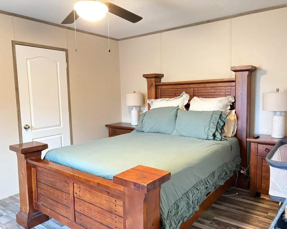 100 Shanee Drive Gloster, LA 71030 - Photo 12 of 19 a bedroom with a bed and a window