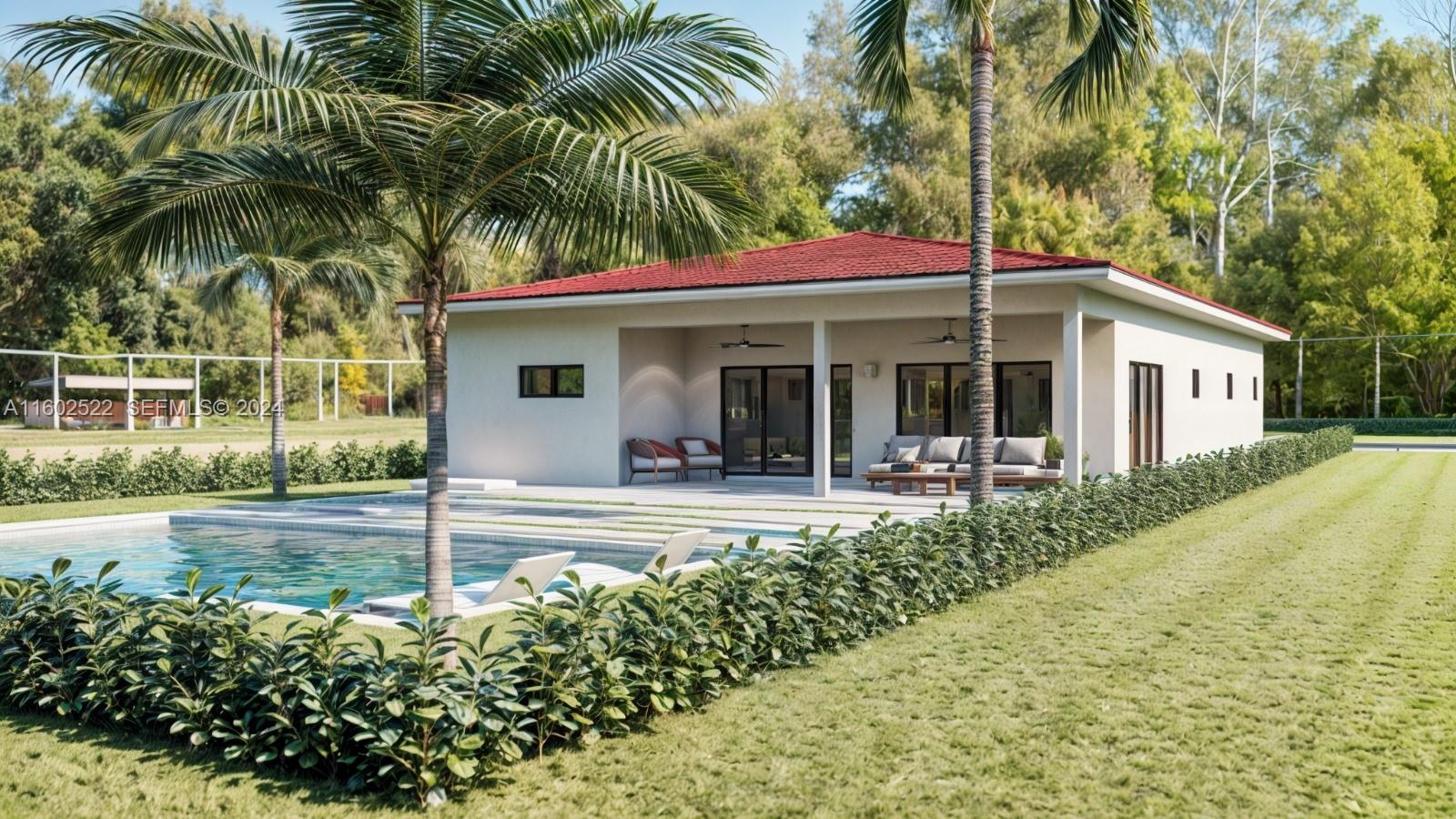 904 Northeast 5th Avenue Homestead, FL 33030 - Photo 6 of 6 front view of a house with a patio