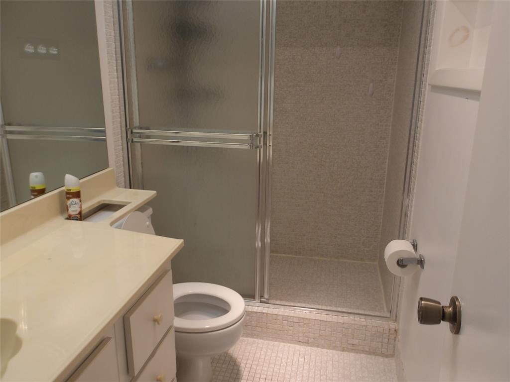 6731 Cypress Road, Unit 309 Plantation, FL 33317 - Photo 14 of 24 a bathroom with a sink and toilet